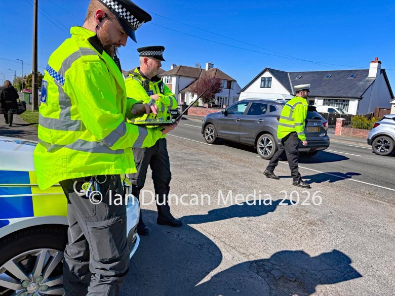 Road safety campaign Operation Colossus in Carlisle where Cumbria police select vehicles at random for inspection in London Road... Officers use a laptop to check vehicle and driver information... Picture: Ian Duncan.