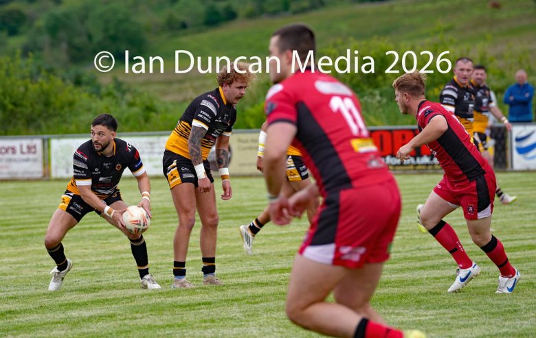 Wath Brow Hornets in black verses Thatto Heath Crusaders in red during a rugby league match in Cleator Moor in Cumbria. Source: Ian Duncan.