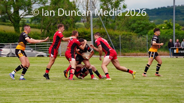 Wath Brow Hornets in black verses Thatto Heath Crusaders in red during a rugby league match in Cleator Moor in Cumbria. Source: Ian Duncan.