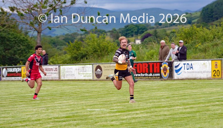 Wath Brow Hornets in black verses Thatto Heath Crusaders in red during a rugby league match in Cleator Moor in Cumbria. Source: Ian Duncan.