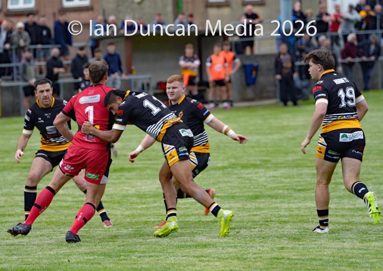Wath Brow Hornets in black verses Thatto Heath Crusaders in red during a rugby league match in Cleator Moor in Cumbria. Source: Ian Duncan.
