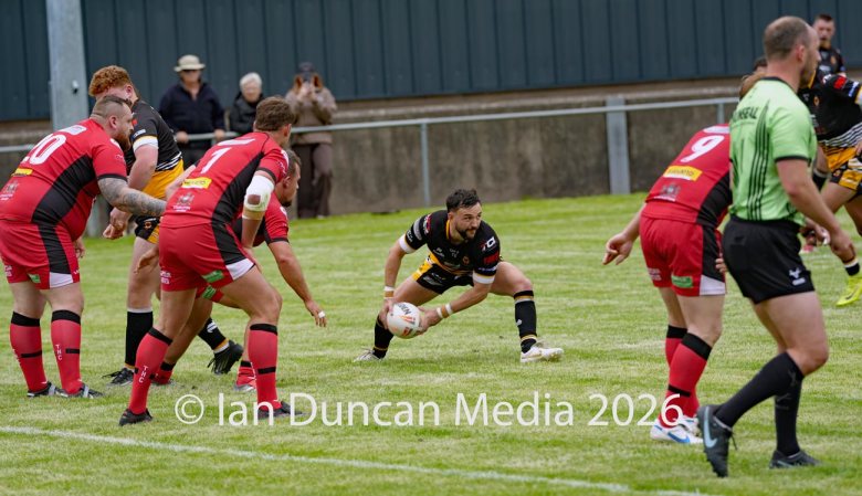 Wath Brow Hornets in black verses Thatto Heath Crusaders in red during a rugby league match in Cleator Moor in Cumbria. Source: Ian Duncan.