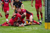 Wath Brow Hornets in black verses Thatto Heath Crusaders in red during a rugby league match in Cleator Moor in Cumbria. Source: Ian Duncan.