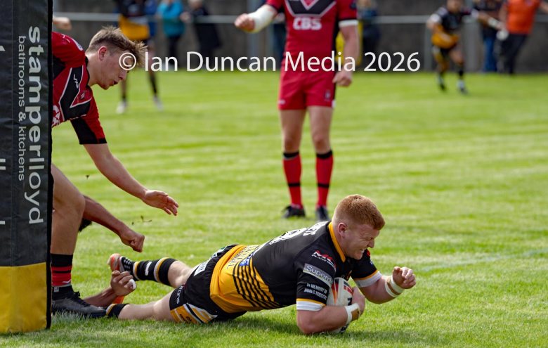 Wath Brow Hornets in black verses Thatto Heath Crusaders in red during a rugby league match in Cleator Moor in Cumbria. Source: Ian Duncan.
