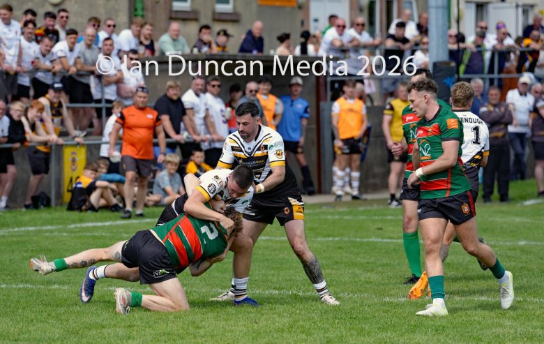 Wath Brow hornets in white shirts halt a West Bowling advance. Picture by Ian Duncan.