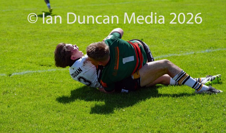Natty Dougan scores his try for Wath Brow hornets, in white shirts, against West Bowling. Picture by Ian Duncan.