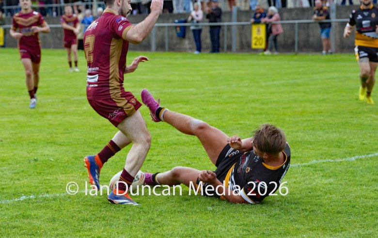 FIRST TRY... 17-year-old Conrad Dockwray scores his first try for Wath Brow Hornets in their rugby league match against Wigan St Judes at Giel Park in the Wath Brow area of Cleator Moor. In the end the score was 22-24 thanks to a last minute try by Wigan... Picture: Ian Duncan...