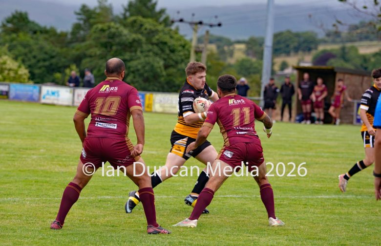ACTION... Wath Brow Hornets in black during their rugby league match against Wigan St Judes at Giel Park in the Wath Brow area of Cleator Moor. In the end the score was 22-24 thanks to a last minute try by Wigan... Picture: Ian Duncan...