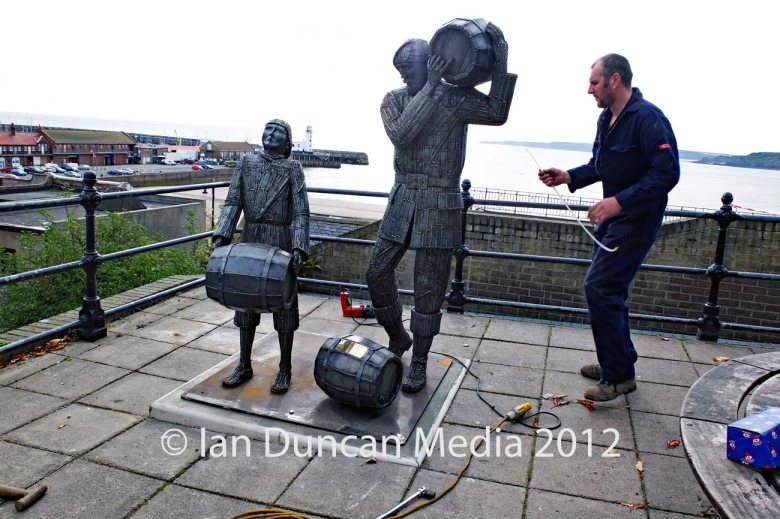Artist Ray Lonsdale installs The Smuggler's Apprentice (Lesson 1) statue in Scarborough in North Yorkshire. Photo: Ian Duncan.