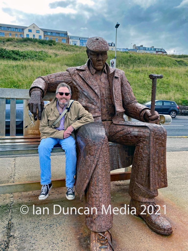 Me and Freddie Gilroy and the Belsen Stragglers statue in Scarborough's North Bay in North Yorkshire by artist Ray Lonsdale. Photo: Ian Duncan.