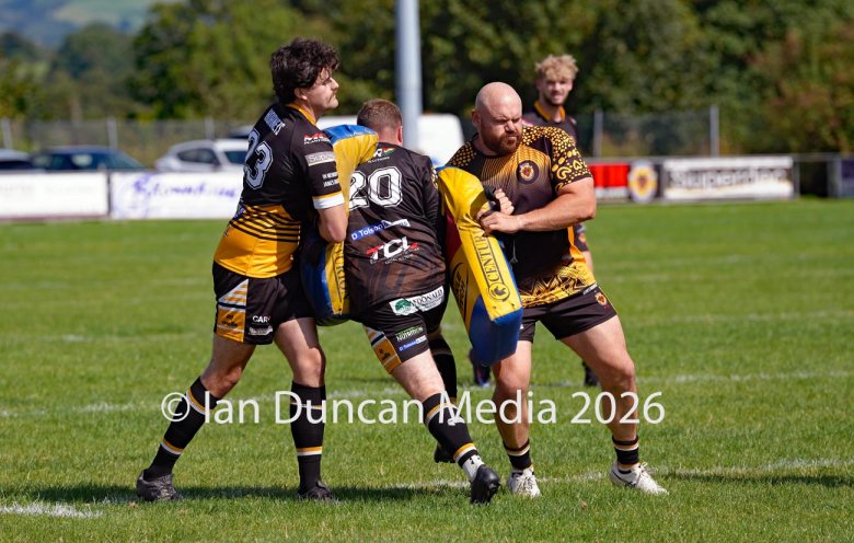 Wath Brow Hornets (in black) v Waterhead Warriors (in green) in the National Premier Rugby League at Giel Park in the Wath Brow area of Cleator Moor in Cumbria... Pre-match training. Picture: Ian Duncan.